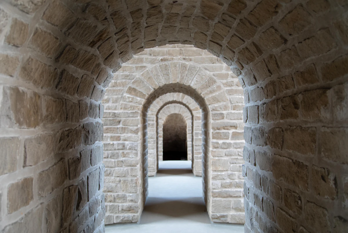 A vaulted stone fortification passage typical of Luxembourg's historic casemates galleries